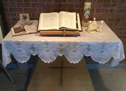 candle and bible on a table